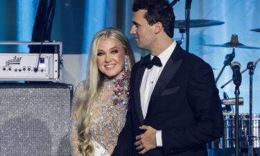 Erika Kirk joins her husband Charlie Kirk on stage during the Turning Point USA Inaugural-Eve Ball at the Salamander Hotel in Washington