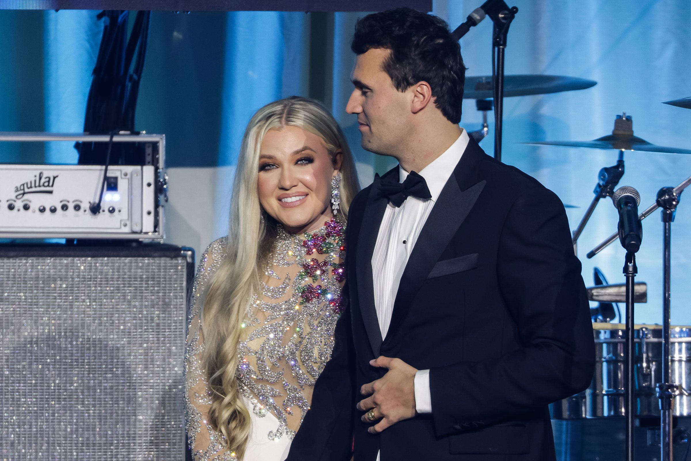 <i>Samuel Corum/Getty Images/File via CNN Newsource</i><br/>Erika Kirk joins her husband Charlie Kirk on stage during the Turning Point USA Inaugural-Eve Ball at the Salamander Hotel in Washington