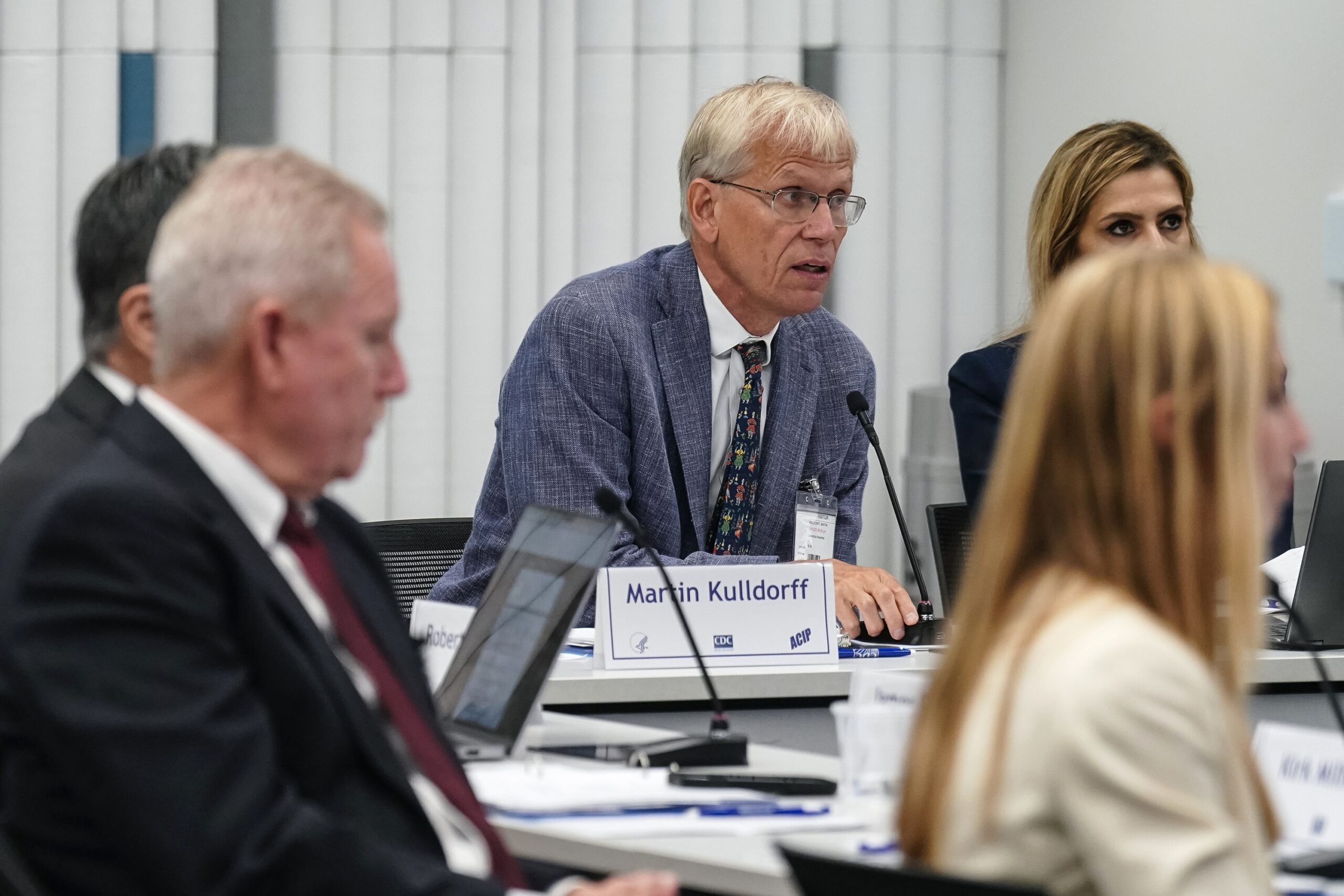A meeting of the CDC's vaccine advisers got off to a chaotic start on Friday with a delayed vote on one vaccine and a redo of a vote from Thursday.