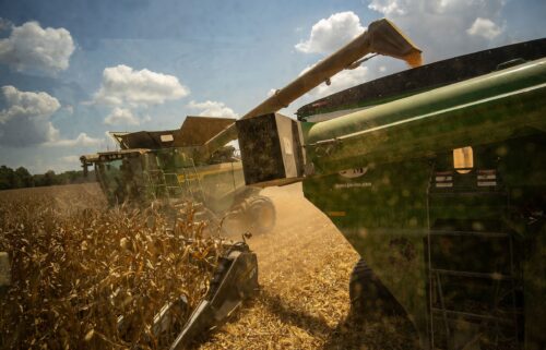 A worker prepares soybeans for planting at a farm in Tiffin
