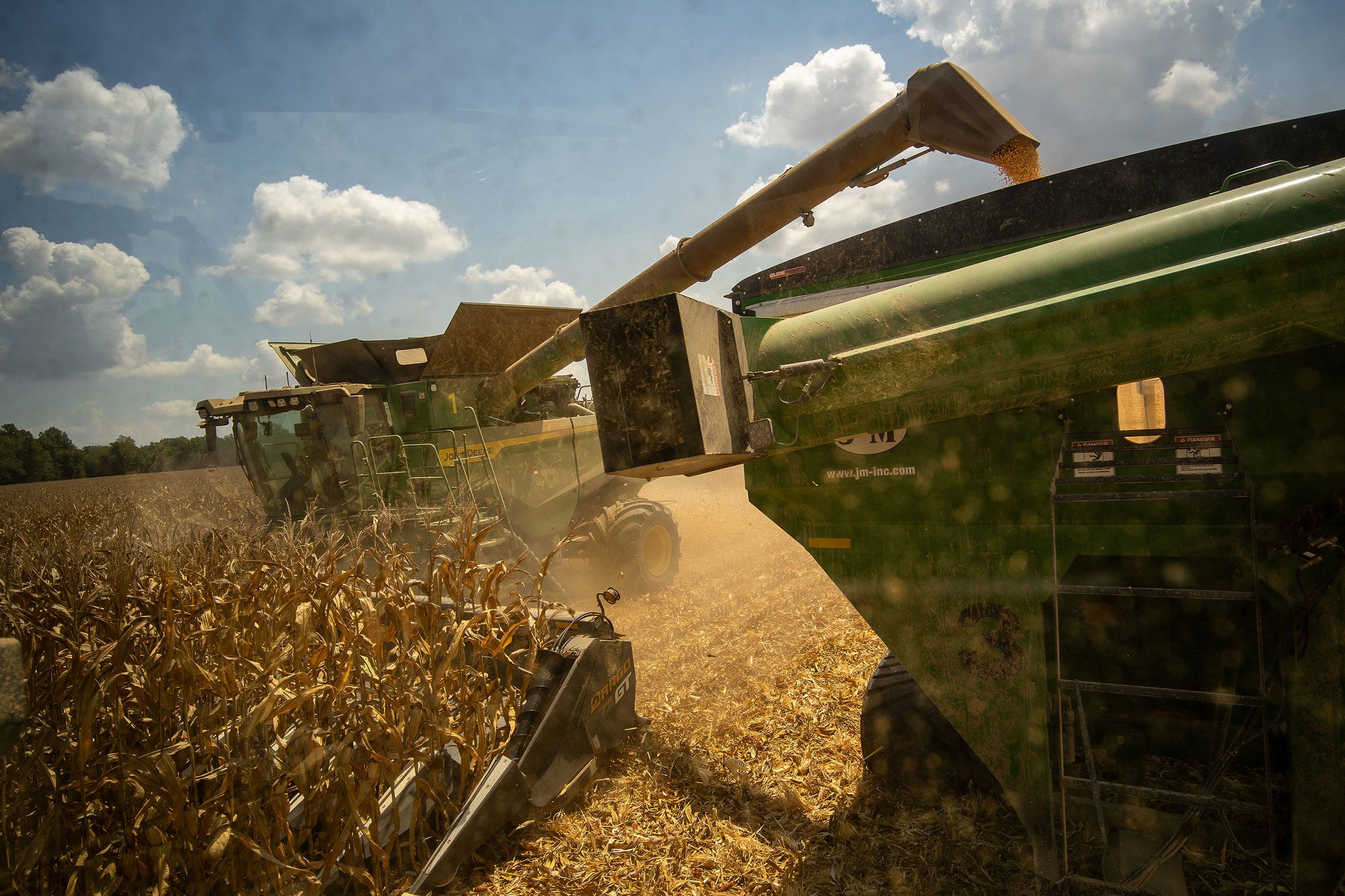 A worker prepares soybeans for planting at a farm in Tiffin