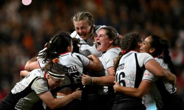 New Zealand's Ayesha Leti-I'iga attempts to gather the loose ball while under pressure from Canada's Shoshanah Seumanutafa.