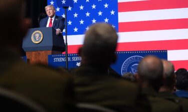 President Donald Trump arrives to address senior military officers gathered at Marine Corps Base Quantico on September 29.