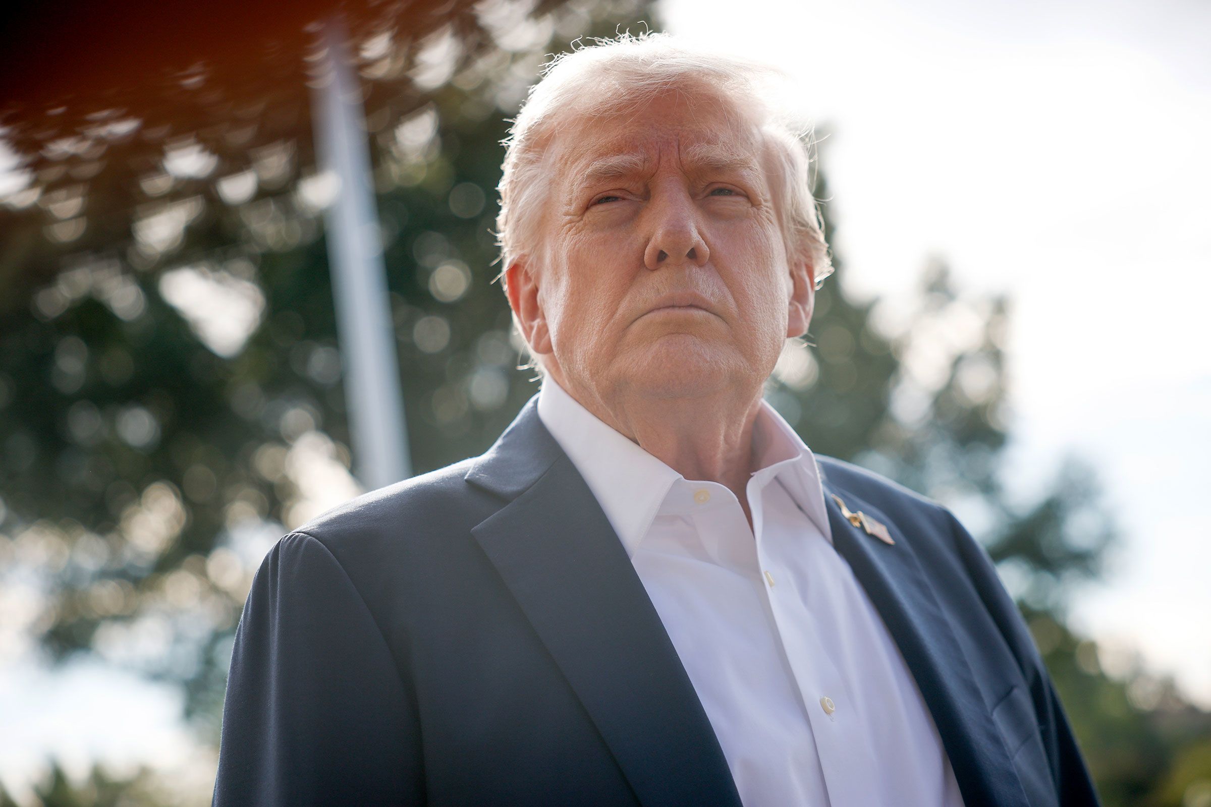 President Donald Trump speaks to members of the media as he departs the White House on September 26. Trump told reporters he expects other political opponents to be prosecuted after the indictment of former FBI Director James Comey.