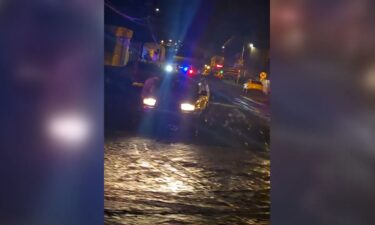 Video of police and emergency vehicles on Saturday after flash flooding swept through Globe