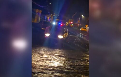 Video of police and emergency vehicles on Saturday after flash flooding swept through Globe
