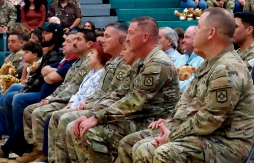 New Mexico National Guardsmen attend a ceremony to mark their deployment to the southern border.