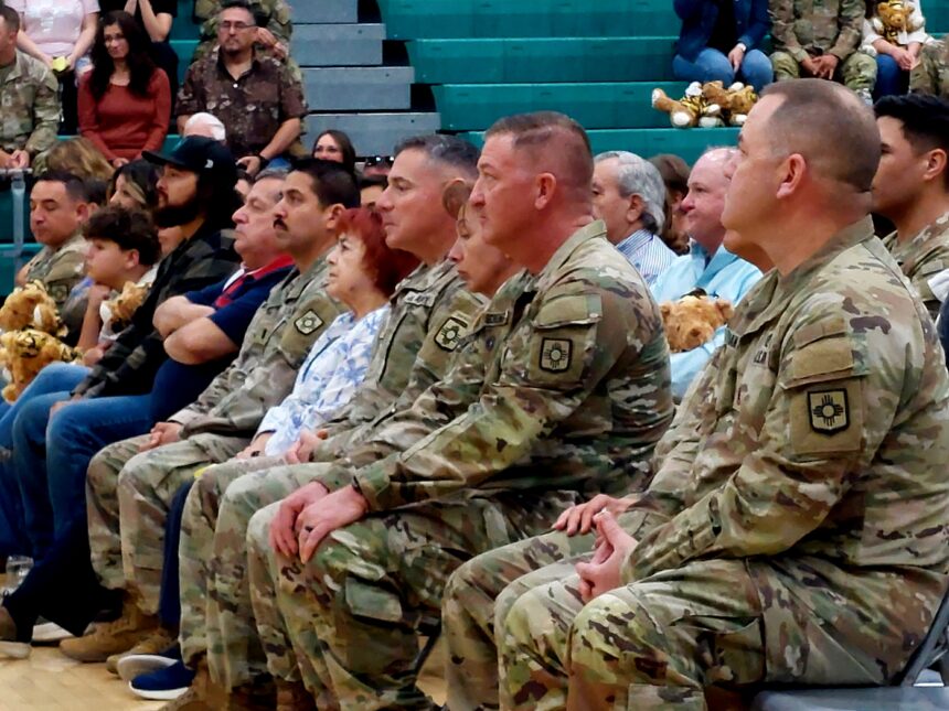 New Mexico National Guardsmen attend a ceremony to mark their deployment to the southern border.