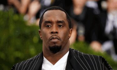 Law enforcement officers stand guard outside the court after Sean "Diddy" Combs was sentenced to more than four years in prison on Friday.