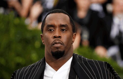 Law enforcement officers stand guard outside the court after Sean "Diddy" Combs was sentenced to more than four years in prison on Friday.