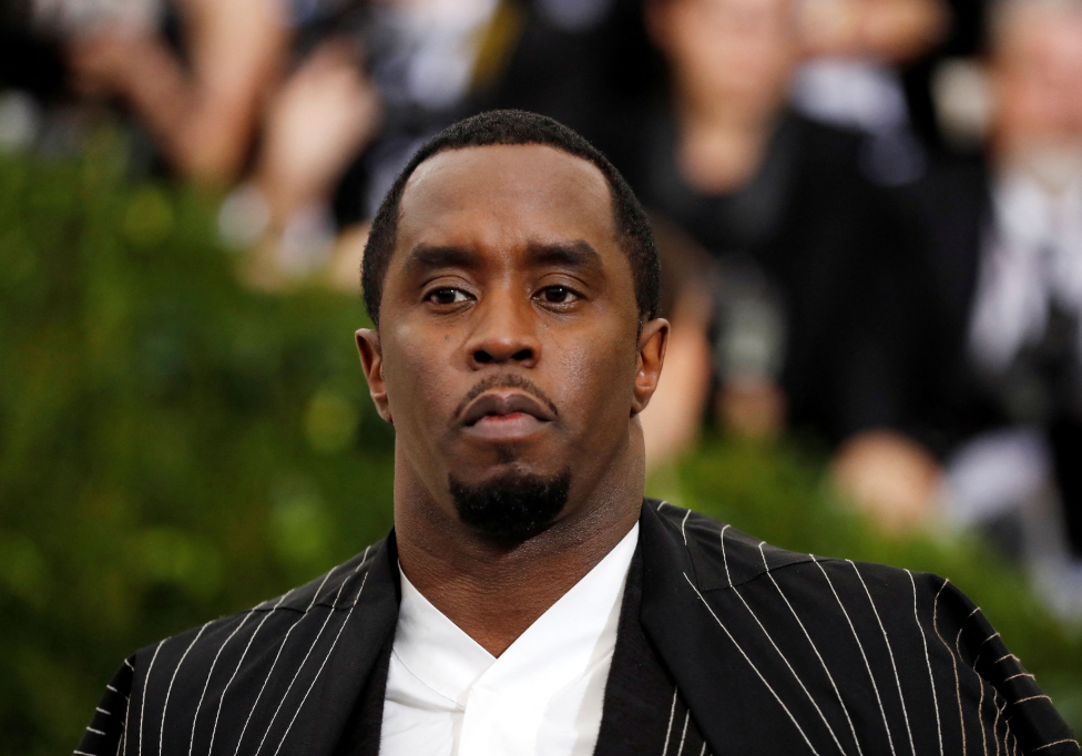 Law enforcement officers stand guard outside the court after Sean "Diddy" Combs was sentenced to more than four years in prison on Friday.