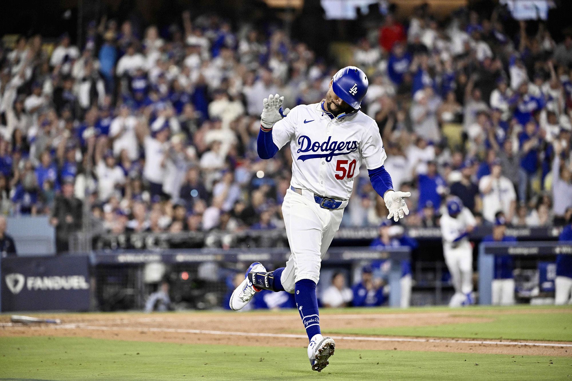 <i>Daniel Shirey/MLB/Getty Images via CNN Newsource</i><br/>Jazz Chisholm Jr. dives into home to score in the eighth inning.