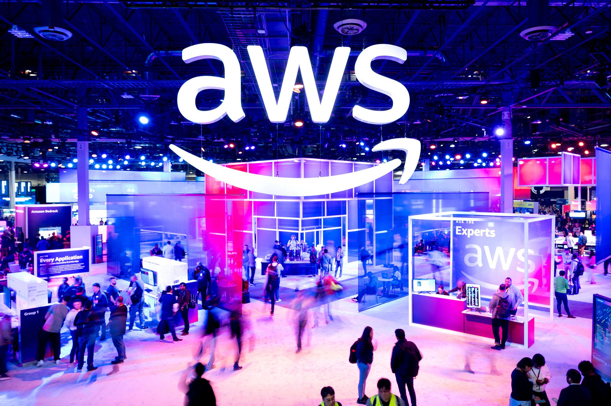 Amazon Web Services logo is displayed at a conference. The service went down for several hours Monday.