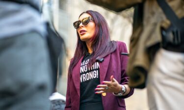 Far-right activist Laura Loomer speaks to the media prior to the beginning of former President Donald Trump's Trial at Manhattan Criminal Court in April 2024 in New York City.