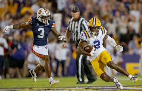 Former LSU wide receiver Lacy runs after a catch against Auburn in October 2023.