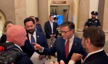 Democratic Sens. Mark Kelly and Ruben Gallego confront House Speaker Mike Johnson outside his office in the US Capitol on October 8.