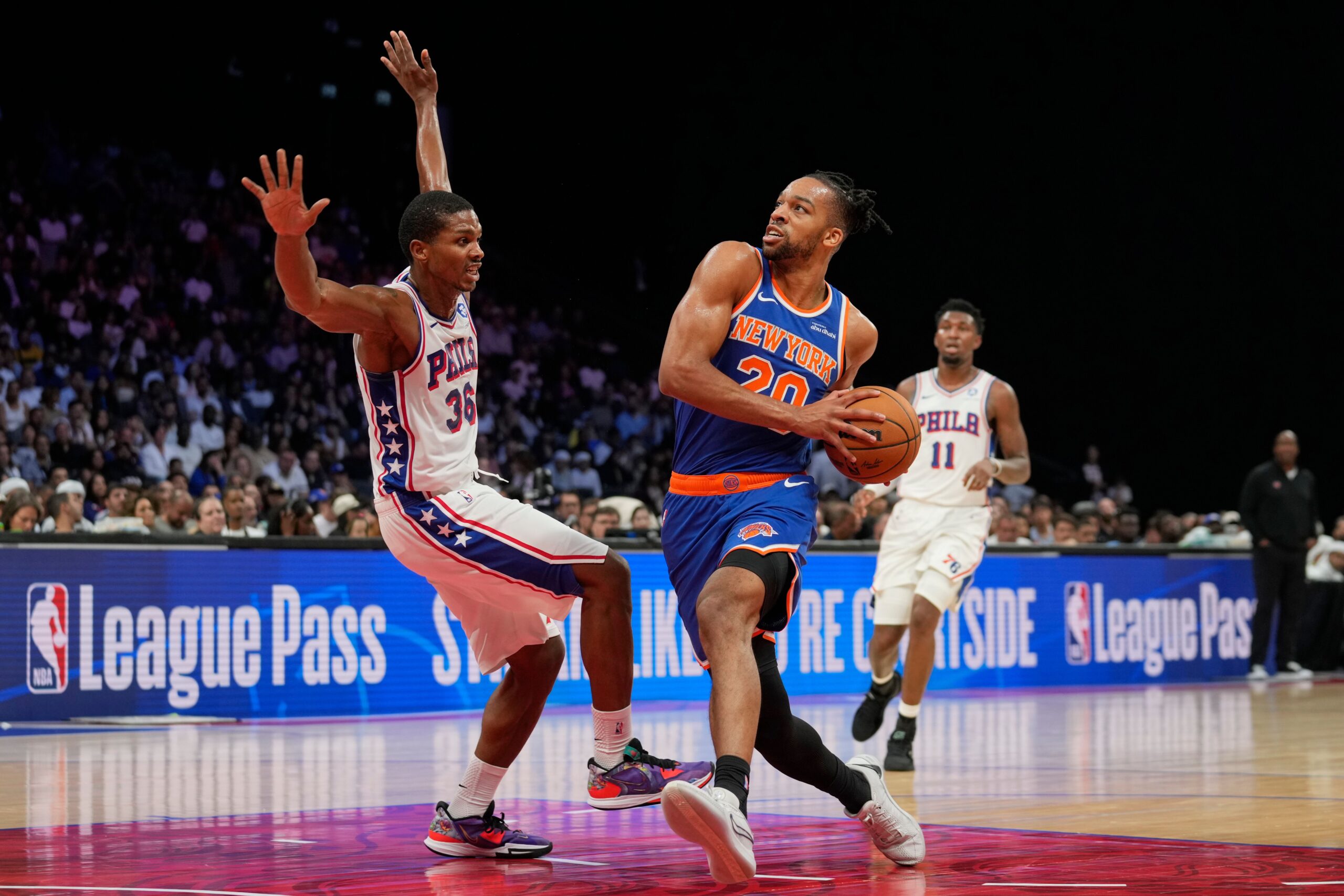 <i>Altaf Qadri/AP via CNN Newsource</i><br/>British New York Knicks forward Tosan Evbuomwan drives to the hoop during a preseason game against the Philadelphia 76ers in Abu Dhabi.