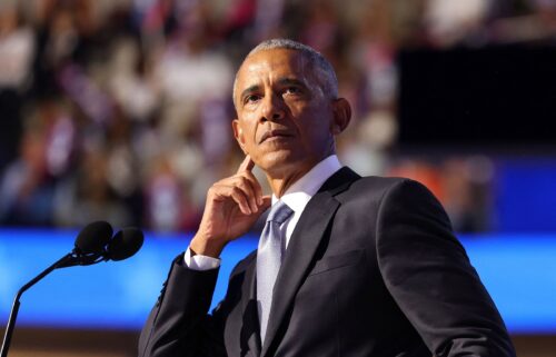 Former President Barack Obama gestures as he speaks at the Democratic National Convention in Chicago on August 20