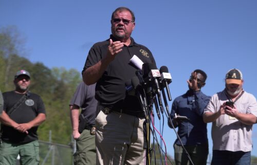 Residents attend a vigil honoring the victims of a blast at an explosives plant