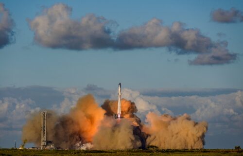 A SpaceX Super Heavy booster carrying the Starship spacecraft lifts off on its 11th integrated test flight at the company's launchpad in Starbase