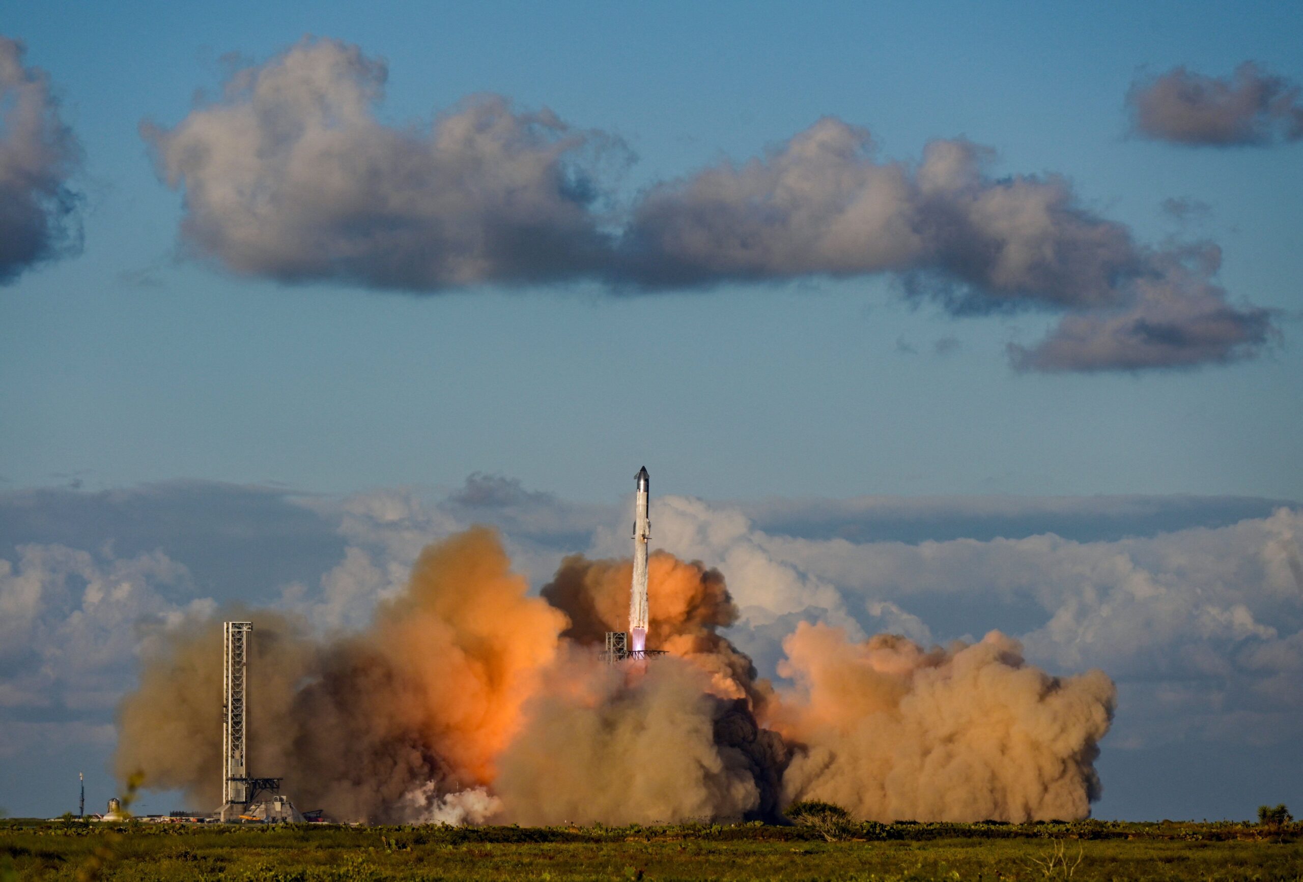 <i>Steve Nesius/Reuters via CNN Newsource</i><br/>A SpaceX Super Heavy booster carrying the Starship spacecraft lifts off on its 11th integrated test flight at the company's launchpad in Starbase