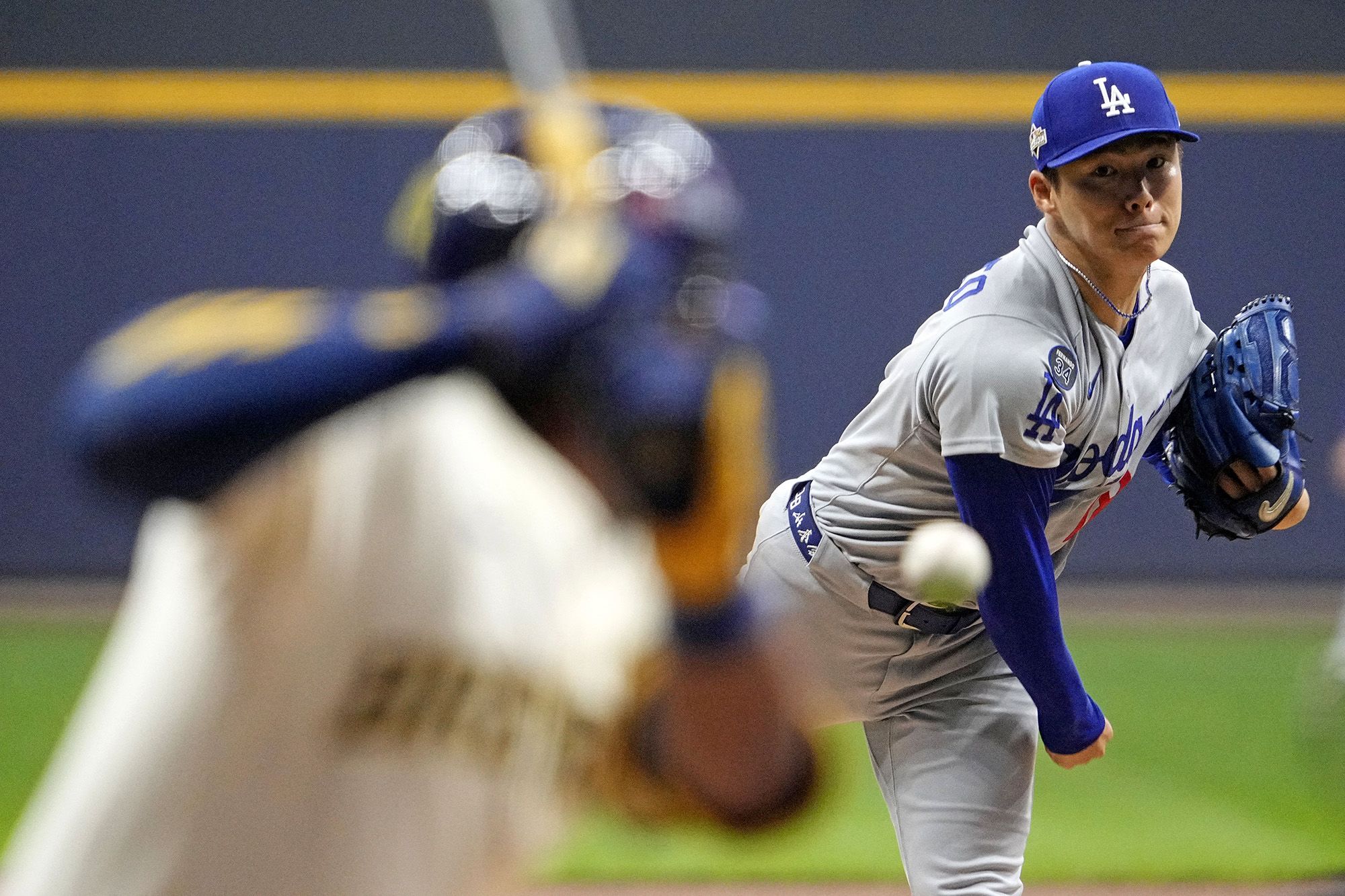 <i>Patrick McDermott/Getty Images via CNN Newsource</i><br/>Yamamoto gave up just one run in the entirety of Game 2 against the Brewers in Game 2 of the NLCS.