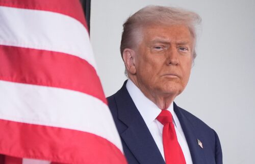 President Donald Trump waits to greet Argentina's President Javier Milei