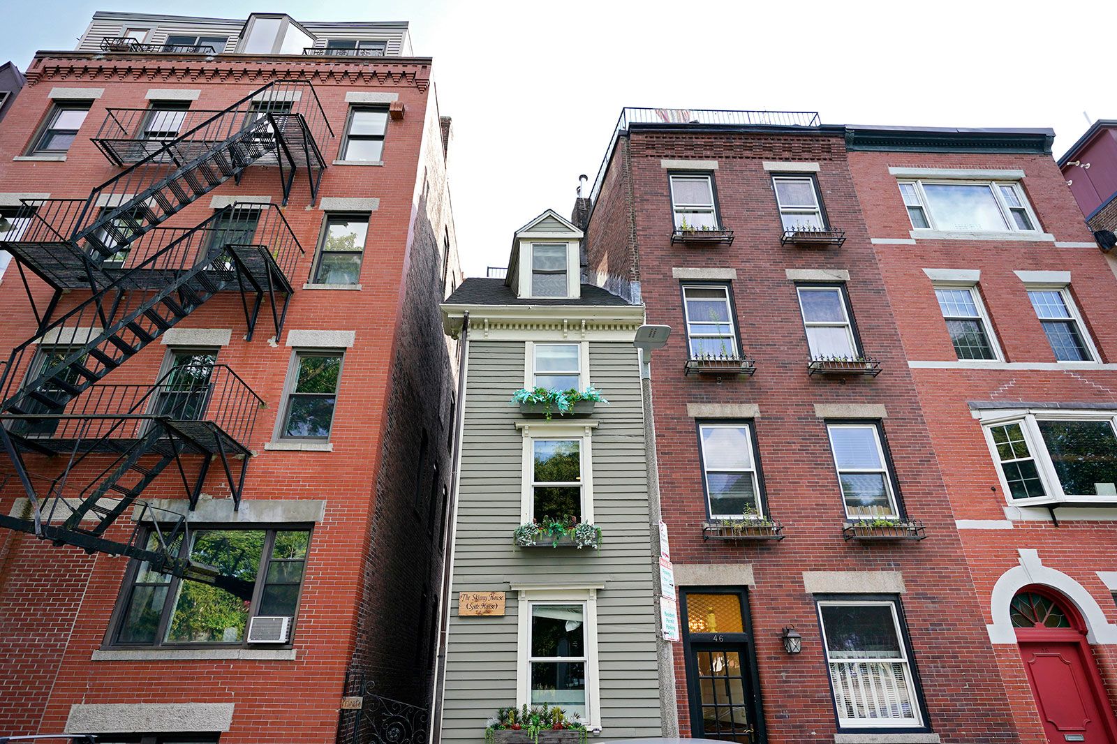 <i>Elise Amendola/AP via CNN Newsource</i><br/>Number 44 Hull Street is so narrow that residents have to enter from the side.