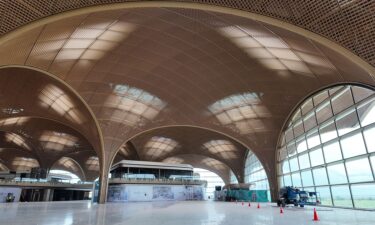 Local trees were planted in baggage claim as a way to acclimate visitors to Cambodia's climate.