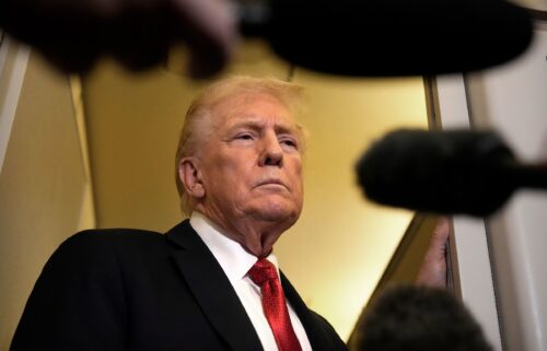 President Donald Trump speaks to reporters aboard Air Force One on Sunday