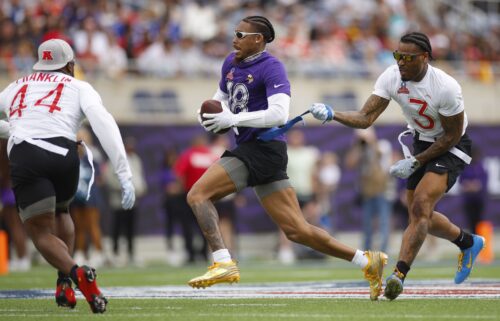 Justin Jefferson of the Minnesota Vikings has his flag pulled by Derwin James Jr. of the Los Angeles Chargers during last season's Pro Bowl in Orlando.