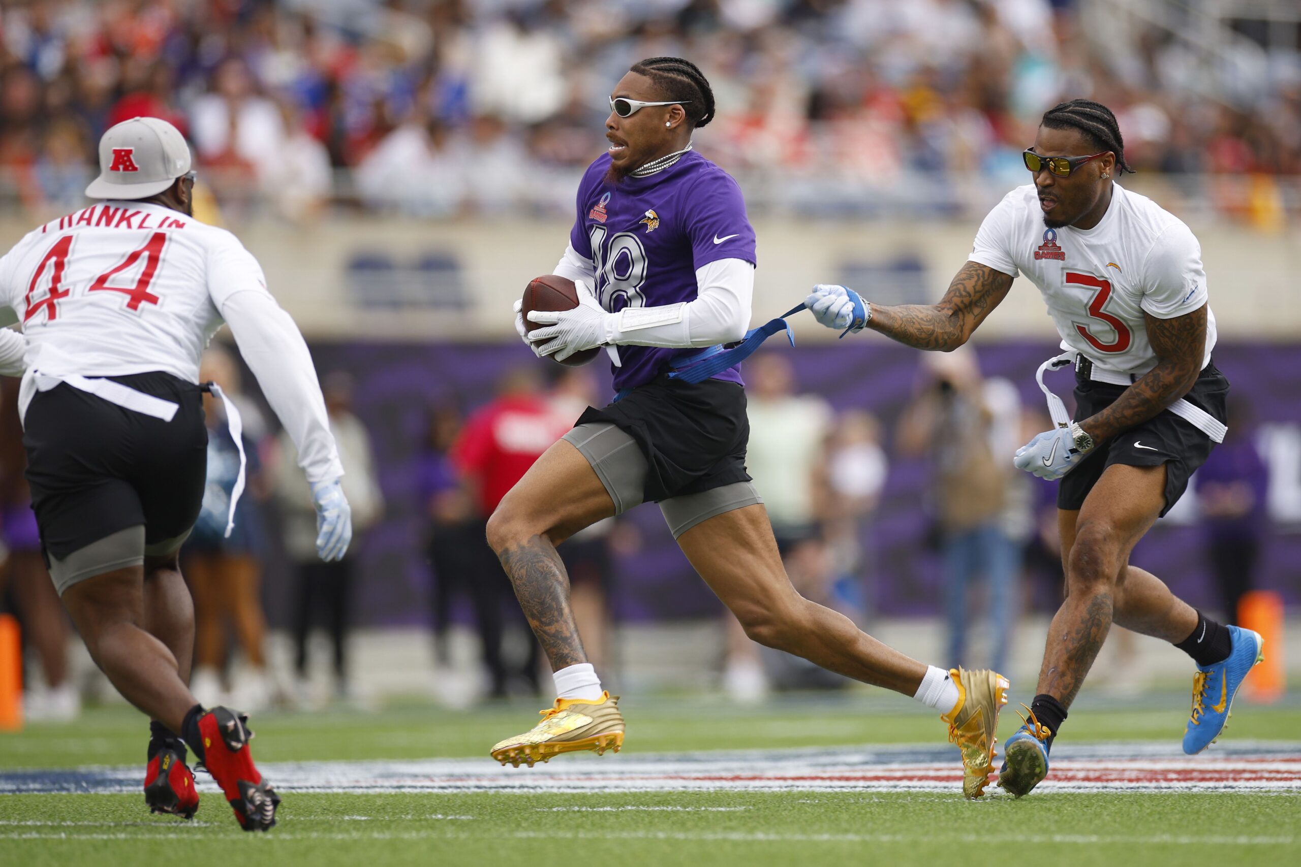 <i>Mike Ehrmann/Getty Images via CNN Newsource</i><br/>Justin Jefferson of the Minnesota Vikings has his flag pulled by Derwin James Jr. of the Los Angeles Chargers during last season's Pro Bowl in Orlando.