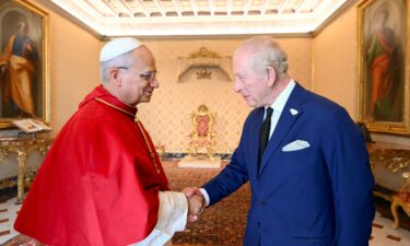 Pope Leo greets King Charles during a private audience at the Vatican October 23