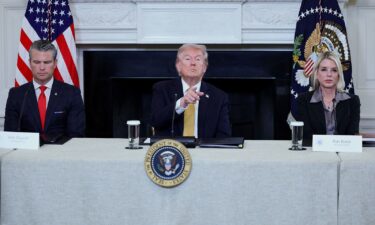 US President Donald Trump gestures during an announcement regarding his administration's policies against cartels and human trafficking