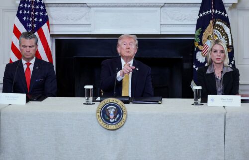 US President Donald Trump gestures during an announcement regarding his administration's policies against cartels and human trafficking