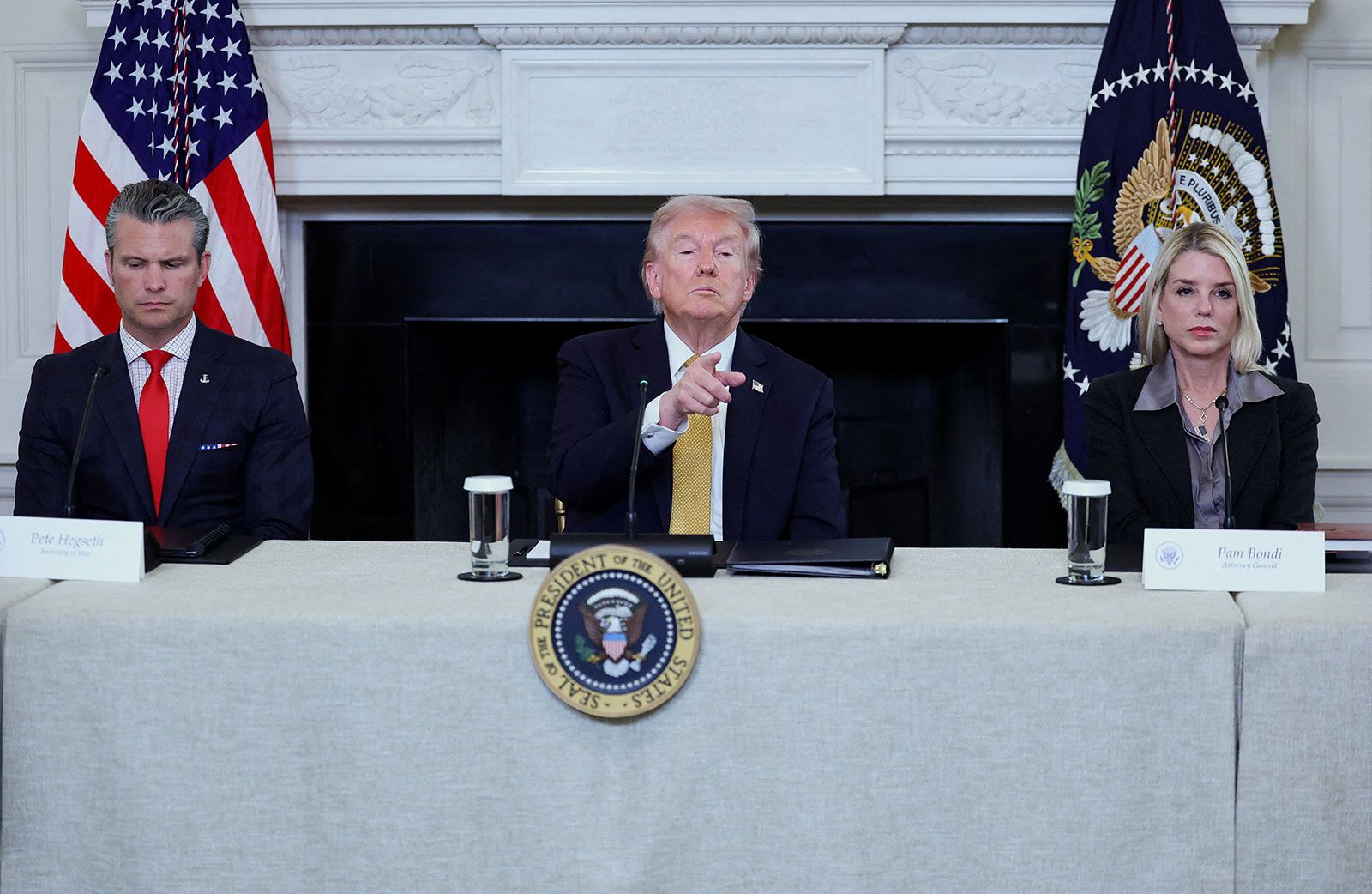 US President Donald Trump gestures during an announcement regarding his administration's policies against cartels and human trafficking