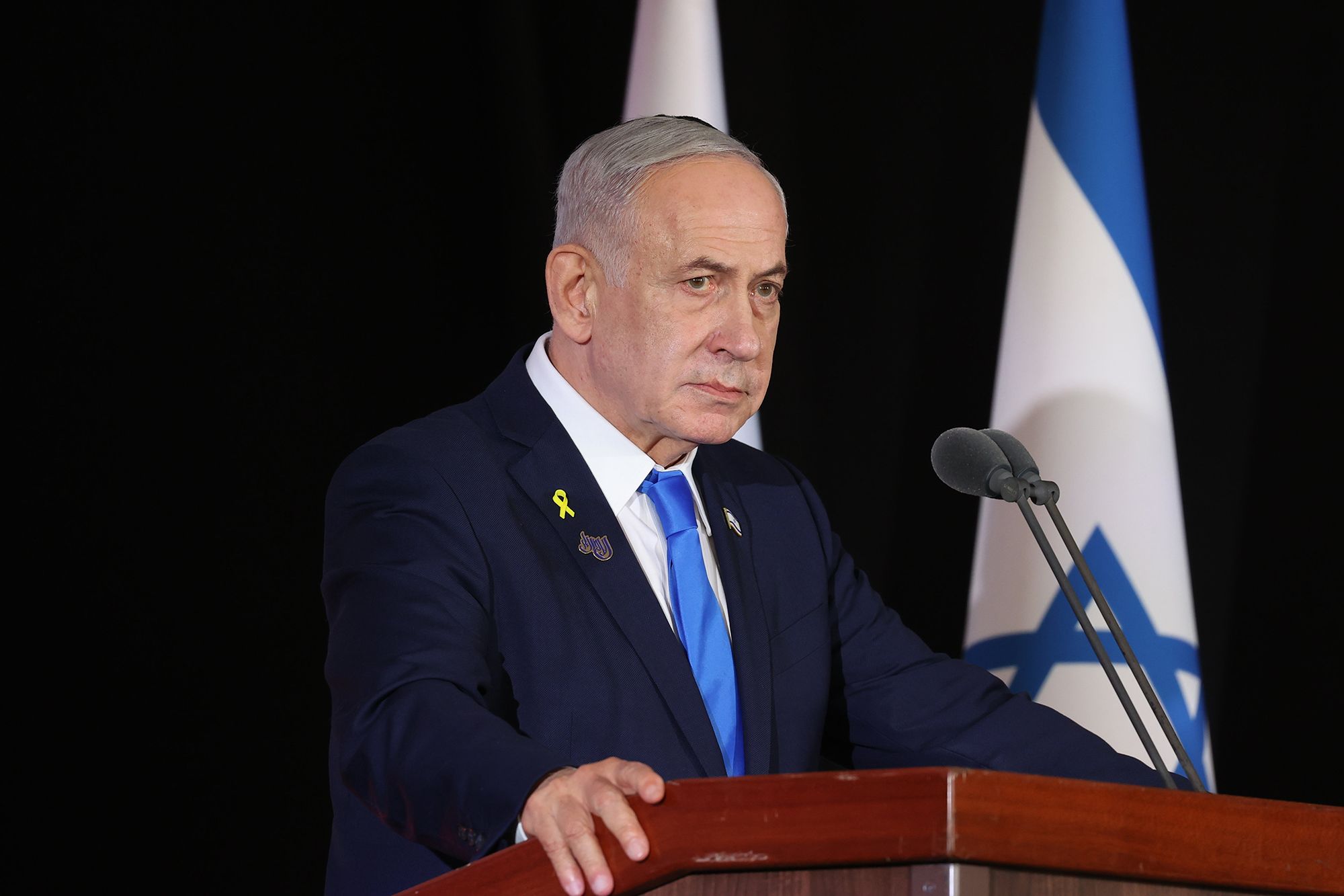 Israeli Prime Minister Benjamin Netanyahu attends a memorial ceremony for soldiers killed in the war on Hamas