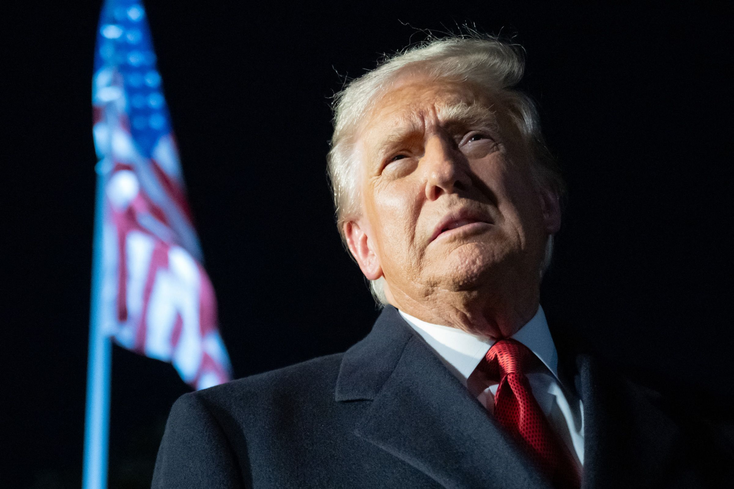 US President Donald Trump speaks to the media as he walks to Marine One in Washington