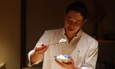 Japanese chef Kenichi Fujimoto samples a serving of Kinmemai Premium