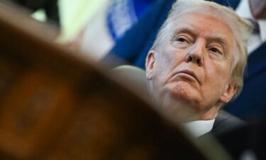 US President Donald Trump listens during an event about weight-loss drugs in the Oval Office of the White House in Washington