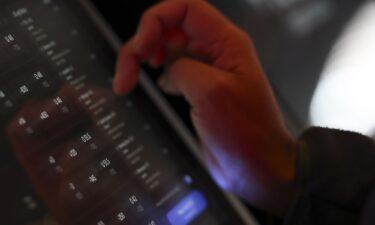 A bettor places a wager at a self-service kiosk in Columbus