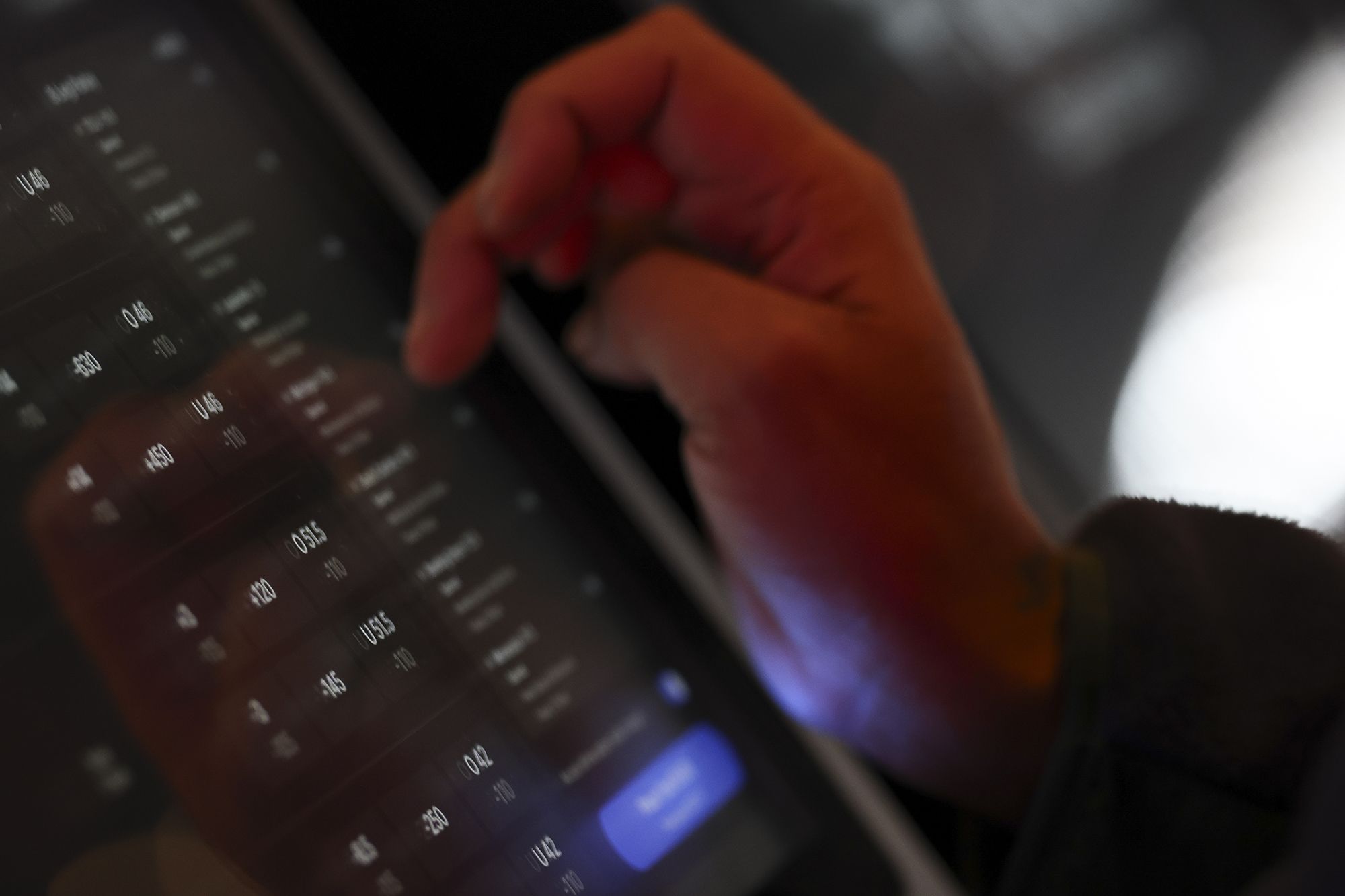 <i>Aaron M. Sprecher/Getty Images via CNN Newsource</i><br/>A bettor places a wager at a self-service kiosk in Columbus