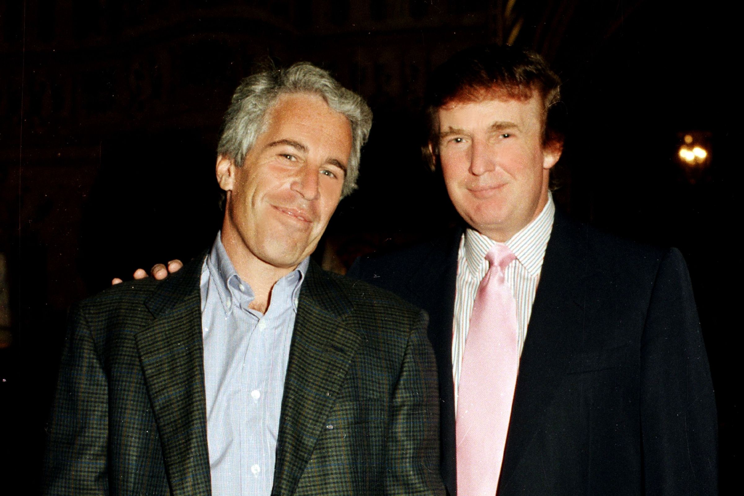 <i>Davidoff Studios/Getty Images via CNN Newsource</i><br/>Portrait of American financier Jeffrey Epstein (left) and real estate developer Donald Trump as they pose together at the Mar-a-Lago estate