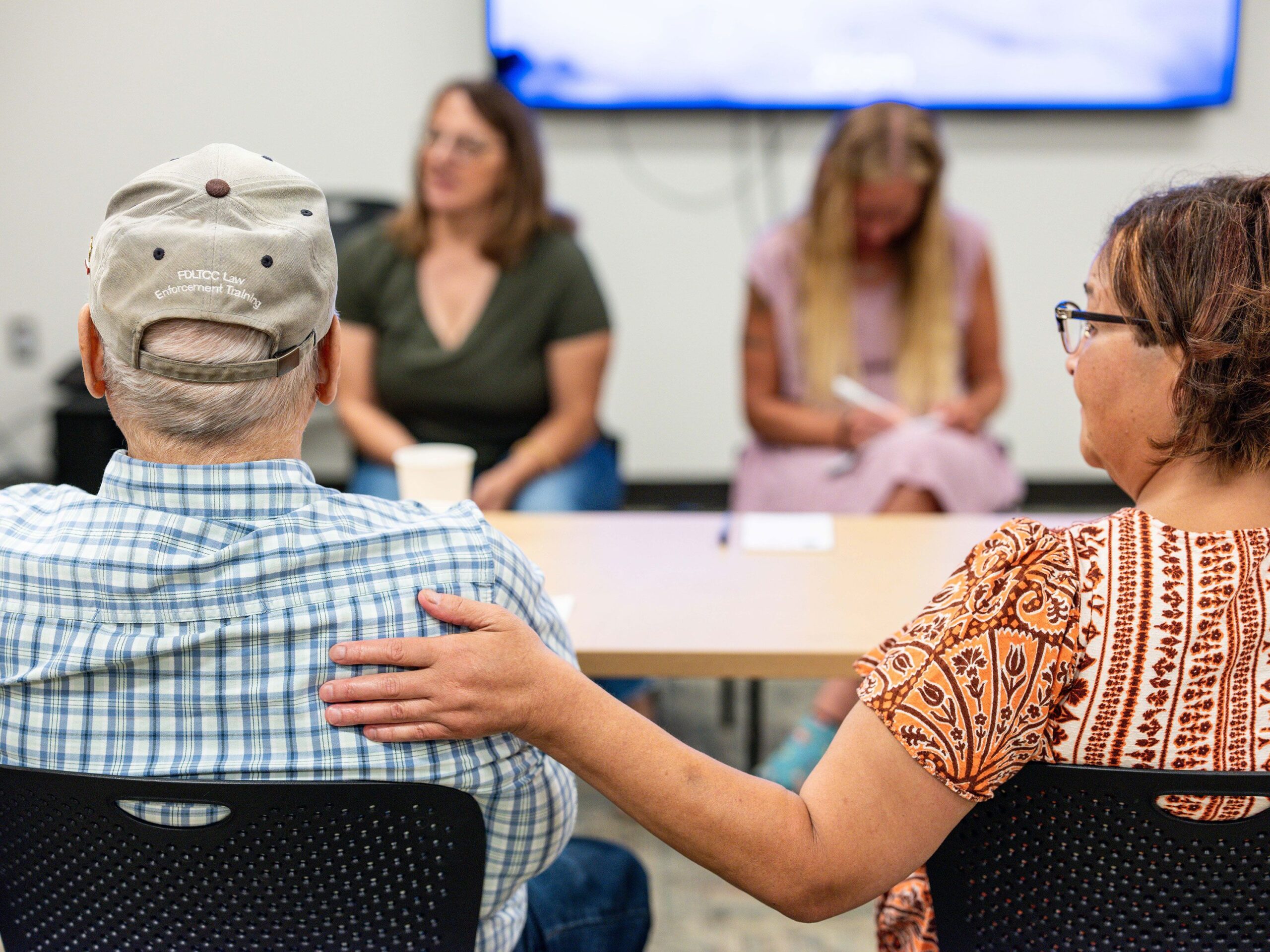 <i>Matthew Busch via CNN Newsource</i><br/>Victoria Smith reaches out to her father