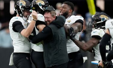 Washington Commanders quarterback Jayden Daniels suffered an arm injury as he is tackled by Seattle Seahawks linebacker Drake Thomas in the second half Sunday.