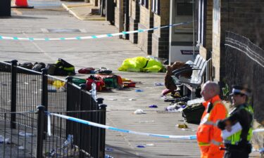 Belongings of passengers are seen on the ground at the entrance to Huntingdon train station after a mass stabbing on a London-bound train.