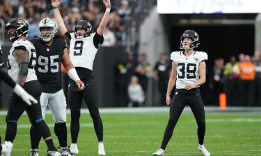 Cam Little watches his record-setting field goal attempt during the second quarter in the game against the Las Vegas Raiders.