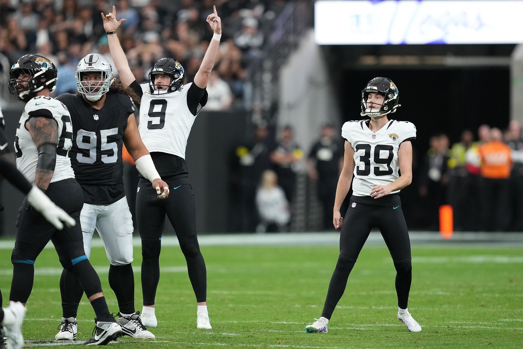 <i>Candice Ward/Getty Images via CNN Newsource</i><br/>Cam Little watches his record-setting field goal attempt during the second quarter in the game against the Las Vegas Raiders.