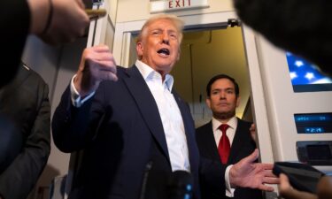 Colombian President Gustavo Petro speaks during a protest against US President Donald Trump's recent comments accusing him of drug trafficking and a court ruling that overturned convictions against former President Alvaro Uribe