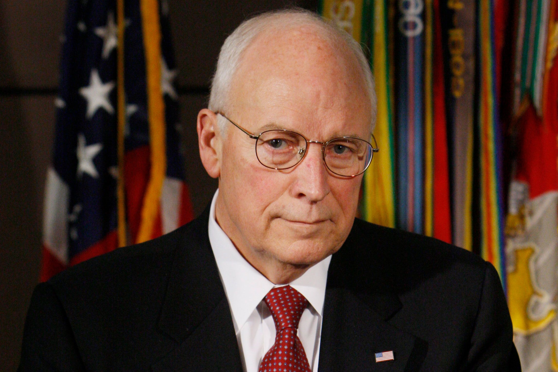 Vice President Dick Cheney listens as President George W. Bush